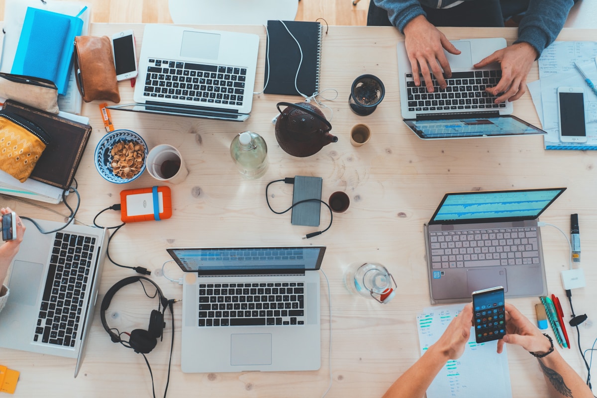 Workspace with laptops and planning materials